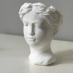 Vāze - balta sievietas galva